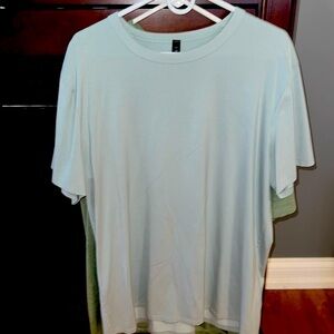 Two Lululemon men’s shirts. Worn once, Sz XXL. Great condition.